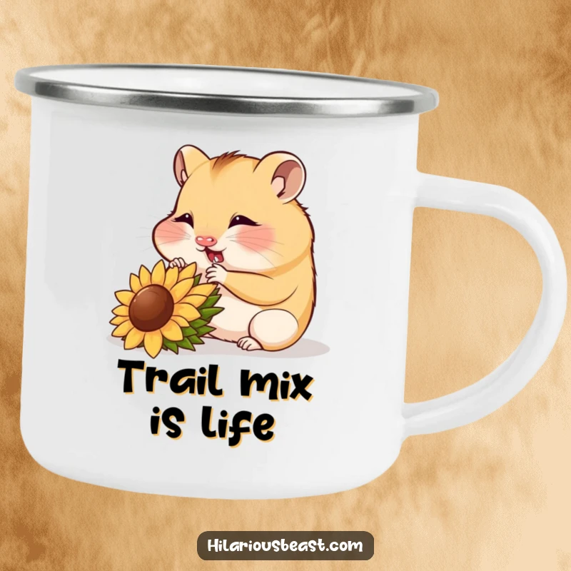 Funny hamster cub munching a sunflower seed, enamel camping mug, outdoor snack humor.