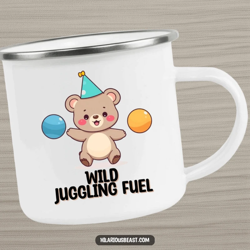 Funny enamel camping mug featuring a happy bear cub in a party hat juggling balls, ideal for outdoor adventures and humorous gifts.