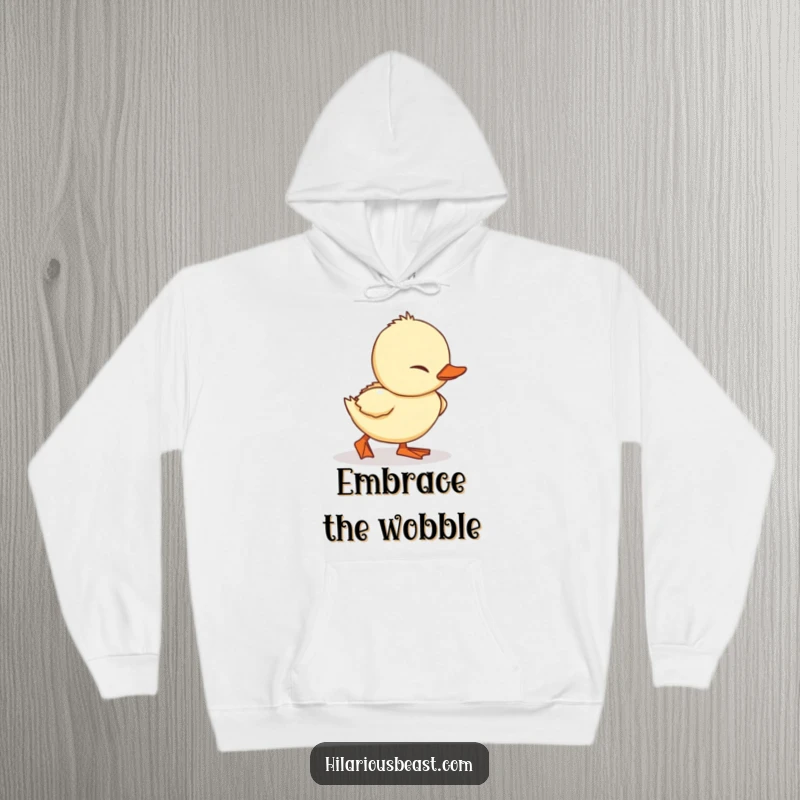 Funny Duckling Hoodie: a cozy sweatshirt featuring a waddling duckling hilariously tripping, showcasing endearing clumsiness.
