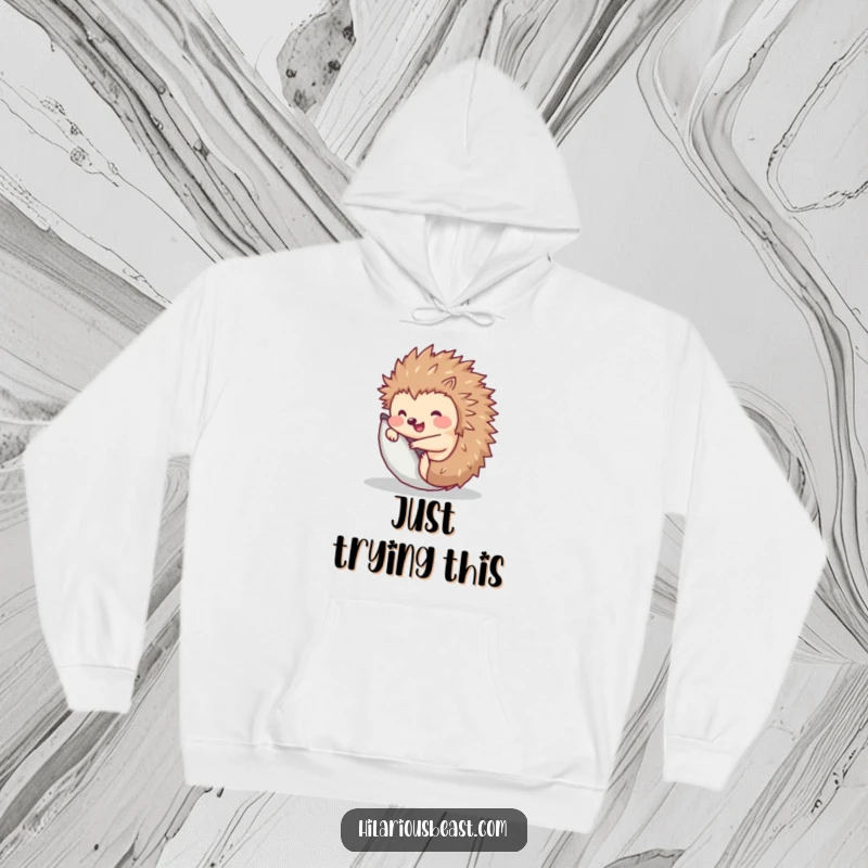 Funny Hedgehog Hoodie: Comfy sweatshirt featuring a cute hedgehog balling up and popping back up.
