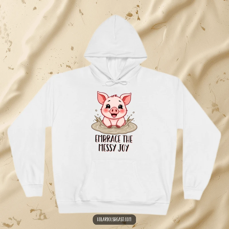 Funny hoodie featuring a happy piglet splashing with glee in a mud puddle, perfect for cozy fun.