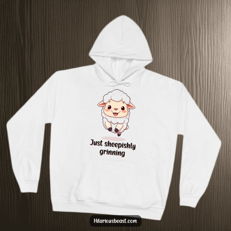Funny hoodie featuring a fluffy sheep with a silly grin, joyfully bouncing on its hooves.