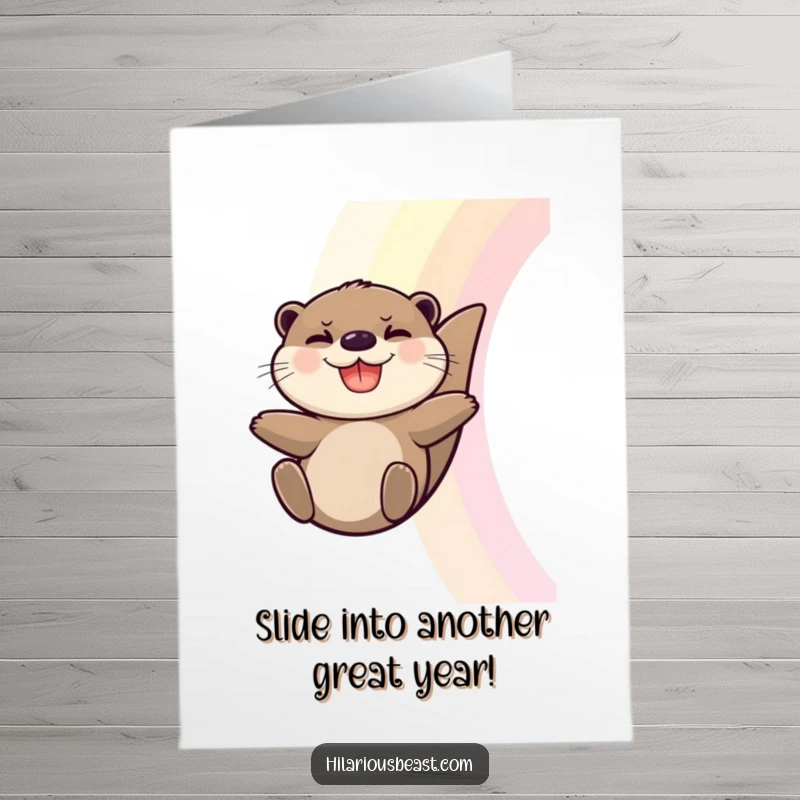 Funny free printable birthday card featuring a grinning otter sliding down a rainbow with pure delight and excitement.
