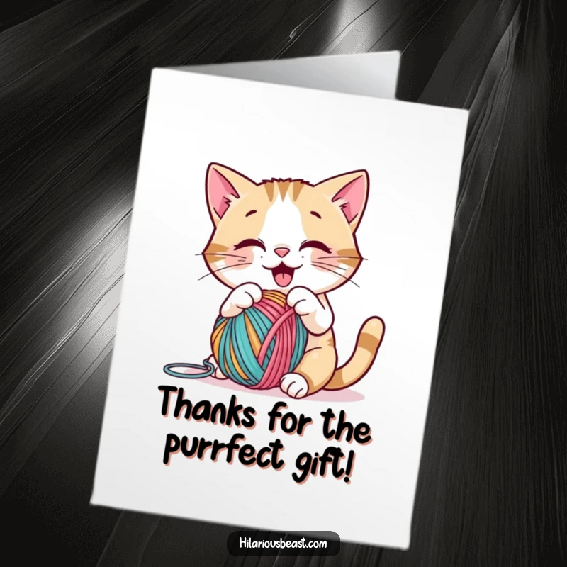 Funny Free Printable Thank You Card: A cute cat batting a colorful yarn ball, a sweet and unique thank you.