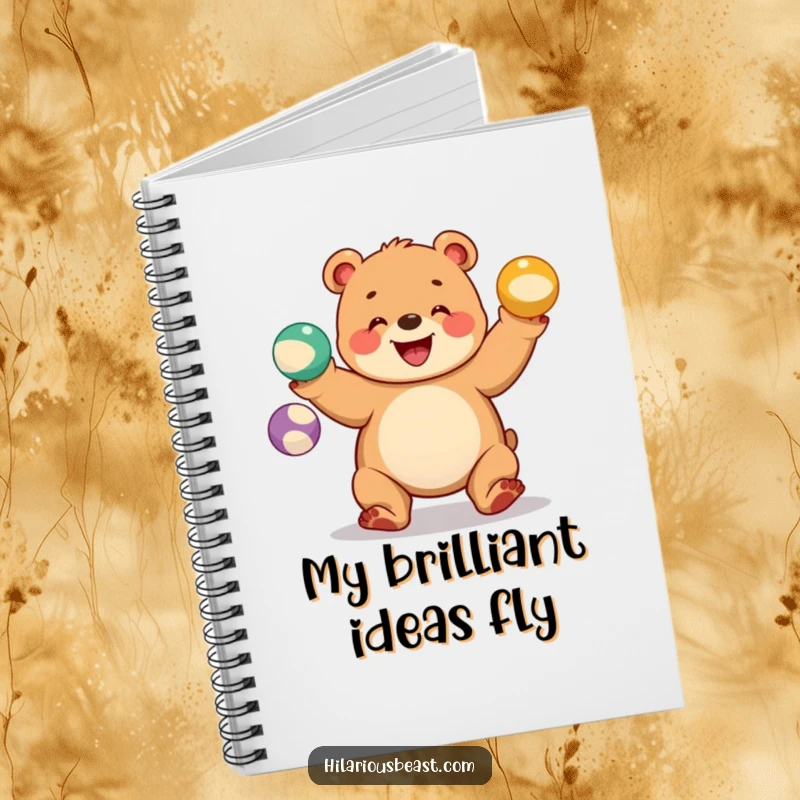 Funny bear cub notebook with a chubby cub juggling three colorful balls with a wide grin, ideal for jotting down playful thoughts.