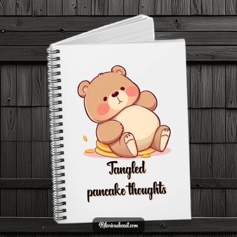 Funny bear notebook, a chubby bear tripping playfully with pancakes askew, encouraging playful notes and delicious breakfast ideas.