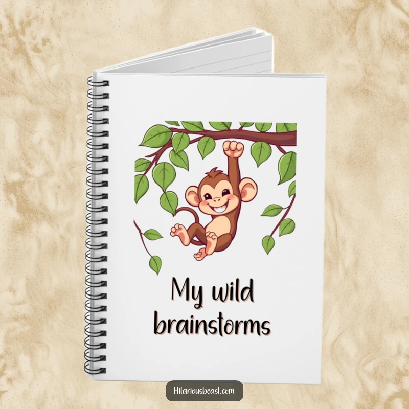 Funny notebook with a mischievous monkey swinging from a vine with a grin.
