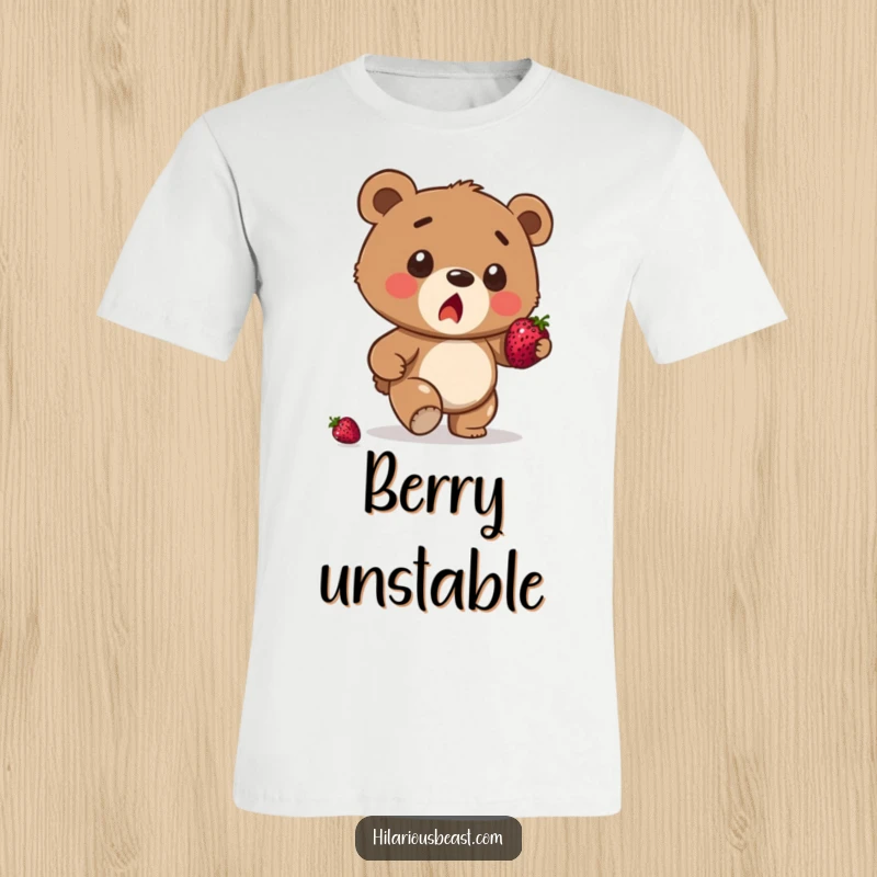 Funny brown bear cub t-shirt, a surprised cub mid-stumble, struggling to balance a juicy berry, capturing a moment of playful chaos.