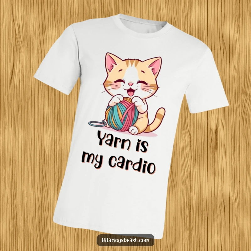 Funny cat batting a colorful yarn ball with pure joy on a comfortable t-shirt, ideal for a humorous funny gift.