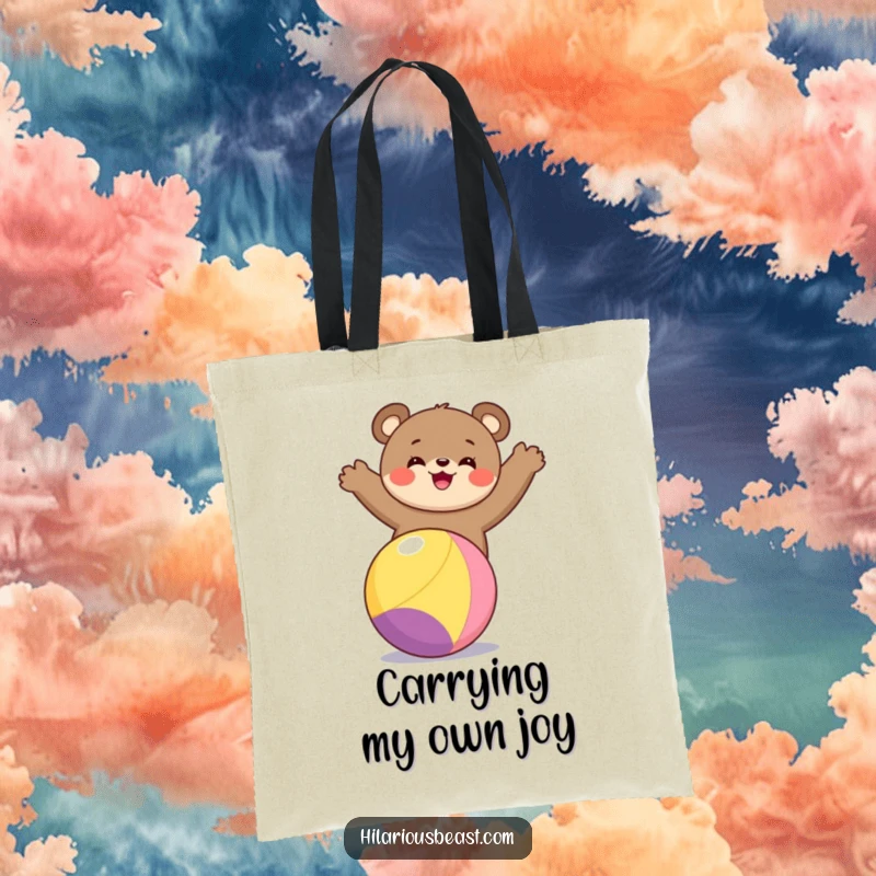 Funny bear cub tote bag depicting a delighted bear cub perfectly poised on a spinning, colorful ball, ready for any adventure.