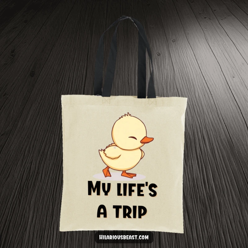 Funny Duckling Tote Bag: a charming canvas bag with a small duckling adorably tripping over its feet.